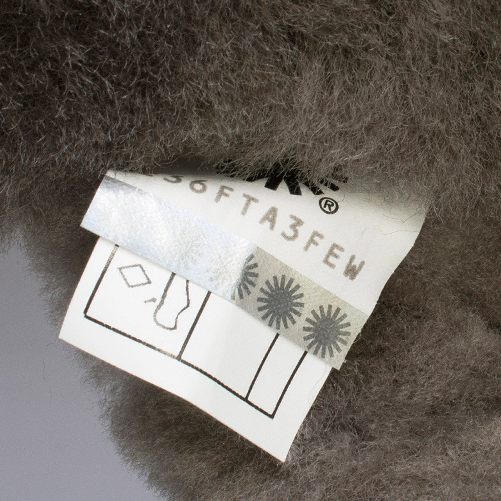 Pantofole da donna in pelle di pecora grigia UGG Icons Abela Crisscross Shearling 1017548